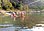 <p>Swimming in a lake or one of the many rivers in the Spanish Pyrenees, or in a swimming pool.</p>