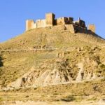 The castle dominates high above Huesca