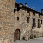 The neighboring house is a 16th century fortified house.